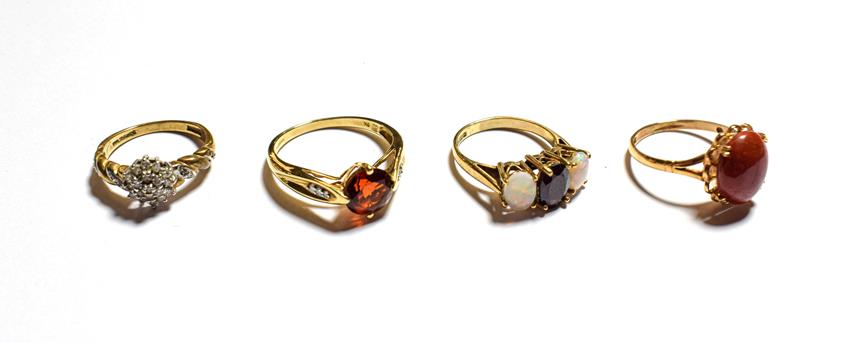 Lot 82 - A 9 carat gold opal and garnet three stone ring, finger size K1/2, a 9 carat gold chalcedony...