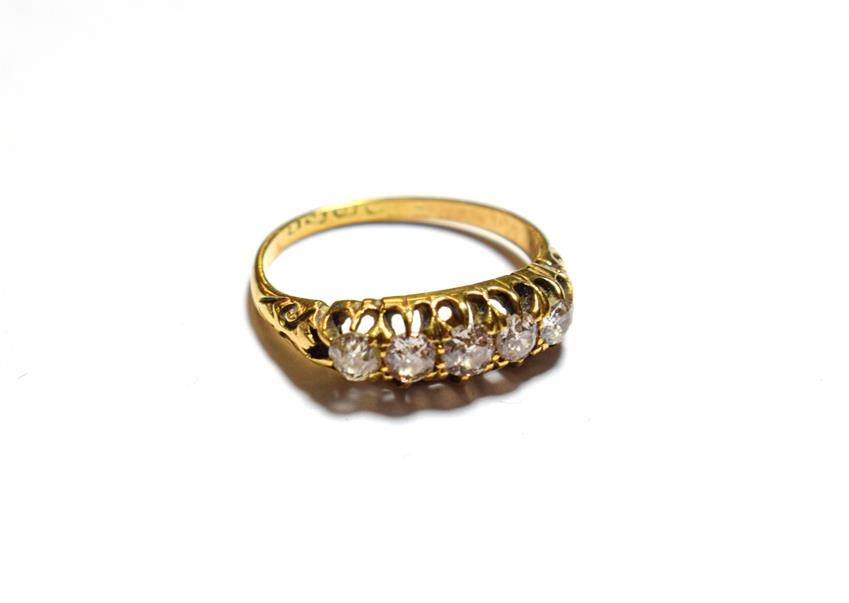 Lot 93 - An 18 carat gold diamond five stone ring, finger size K