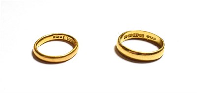 Lot 103 - A 22 carat gold band ring, finger size N and another 22 carat gold band ring, out of shape