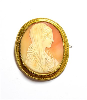Lot 124 - A cameo brooch, depicting a lady wearing a shawl, with rope twist decorated frame (a.f.),...