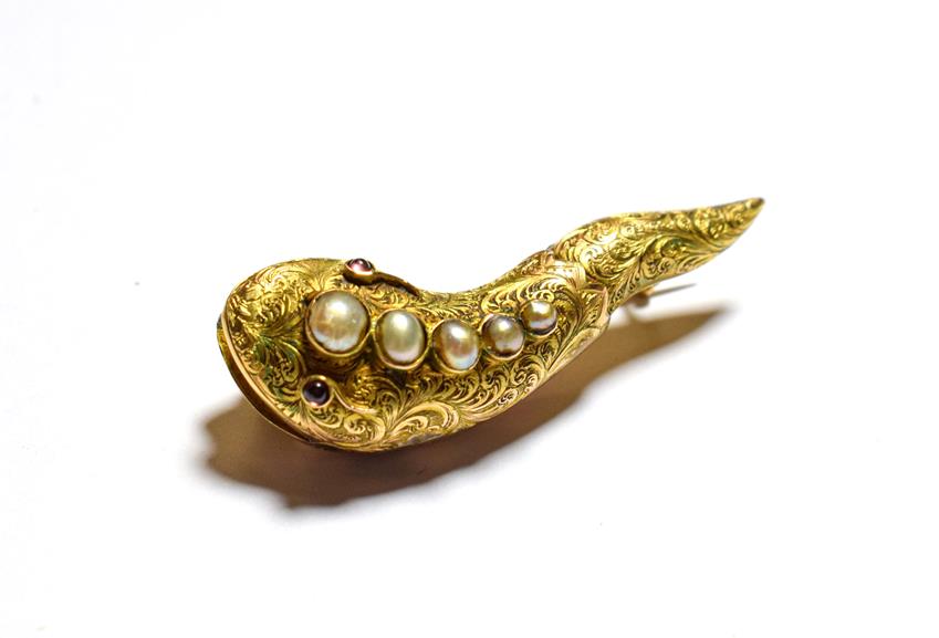 Lot 126 - A Victorian brooch, in the form of a snake with open mouth and bared teeth, engraved to the...
