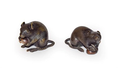 Lot 136 - A pair of Japanese bronze models of rats, feeding on nuts, both signed, 10cm (2)