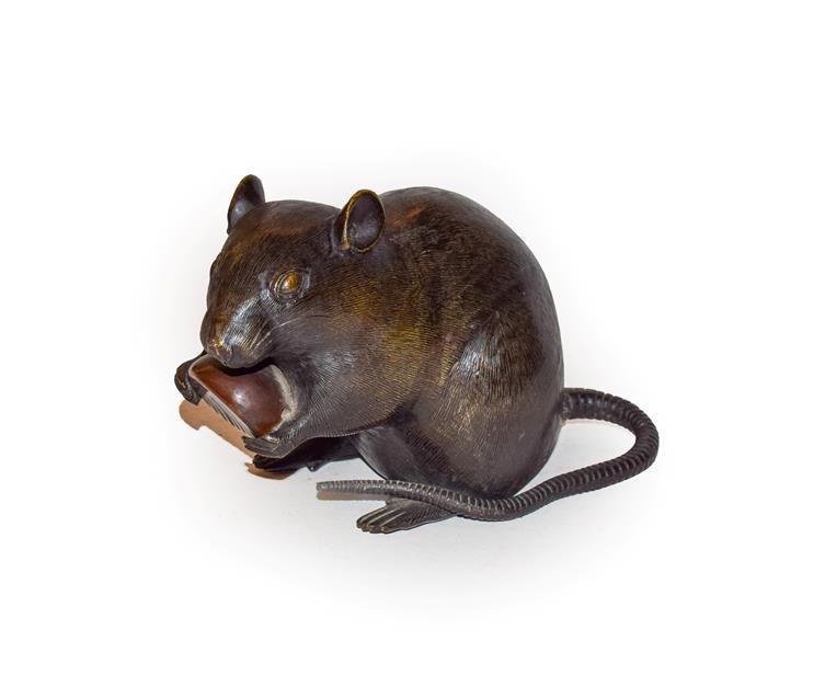 Lot 137 - A Japanese bronze model of a rat, feeding on a nut, 16cm (a.f.)