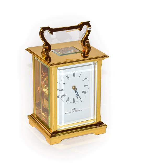 Lot 139 - A brass carriage timepiece signed Matthew Norman, retailed by Boodle & Dunthorne, Liverpool
