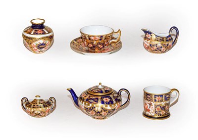 Lot 147 - A Royal Crown Derby Imari pattern miniature four piece tea service, together with a Royal Crown...