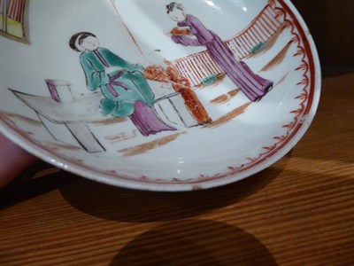 Lot 149 - A Lowestoft teabowl and saucer painted in coloured enamels with Chinese figures circa. 1780, a...