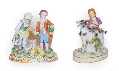 Lot 154 - A Meissen Porcelain Figure of a Boy and Goat, 20th century, the boy holding fruiting vine on a...