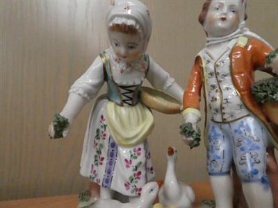 Lot 154 - A Meissen Porcelain Figure of a Boy and Goat, 20th century, the boy holding fruiting vine on a...