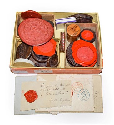 Lot 163 - A collection of wax seal impressions and other items