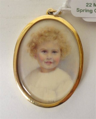 Lot 1378 - D"¦G"¦B"¦: Portrait Miniature of a Child, circa 1910-20, with curly golden hair, brown eyes...