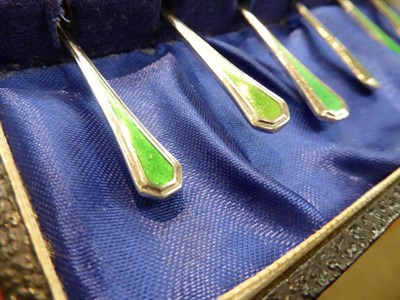 Lot 180 - Set of silver and enamel teaspoons (cased), set of six silver coffee spoons (cased), silver...