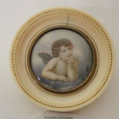 Lot 1380 - After Raphael: Cupid, initialled AB, miniature, circular, 4.5cm, in beaded turned ivory frame...