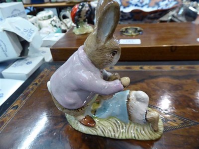 Lot 192 - Fourteen Beatrix Potter figures, boxed (thirteen Royal Albert, one Beswick) Mrs Rabbit and Bunnies