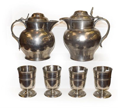 Lot 199 - Four 19th century Pewter half-pint ale measures, inscribed Country Hotel, footed bases with two...