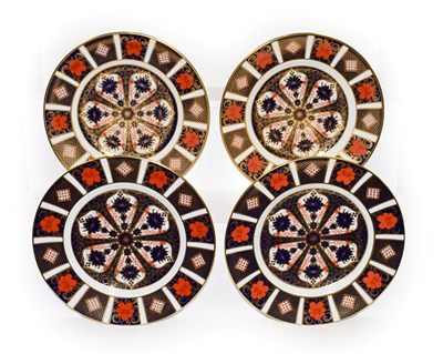 Lot 207 - Four Royal Crown Derby plates decorated in Imari pattern 1128, 21.5cm diameter