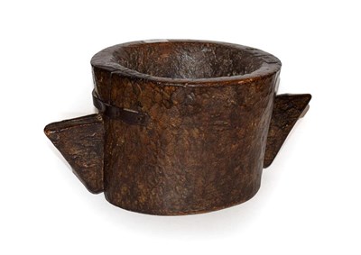 Lot 212 - An 18th century two handled wooden mortar