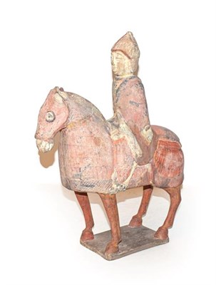 Lot 231 - A Chinese terracotta Tang style horse and rider (a.f.), 35.5cm high, 26cm long