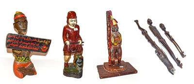 Lot 250 - A Nigerian carved wooden figure with five various others (6)