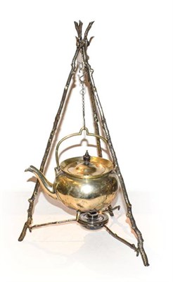 Lot 254 - A novelty silver plated spirit kettle in the form of a cooking tripod, formed from three...