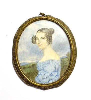 Lot 272 - An early 19th century portrait miniature of a lady in a landscape, signed E. Peter
