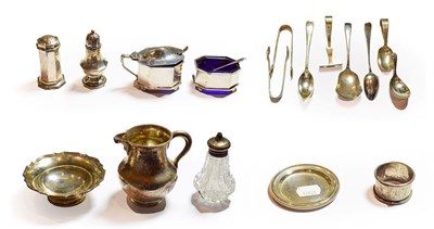 Lot 282 - A selection of silver including Victorian cream jug, pin tray, two salts with blue glass...