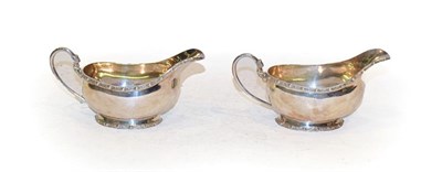 Lot 300 - A pair of Elizabeth II silver sauce boats, by J B. Chatterley and Sons Ltd., Birmingham, 1965,...
