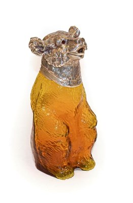 Lot 306 - A silver plate mounted amber glass claret jug, the silver plate mounts marked indistinctly, the...