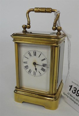 Lot 1394 - A Miniature Brass Carriage Timepiece, signed Henri Jacot, circa 1890, with carrying handle and...