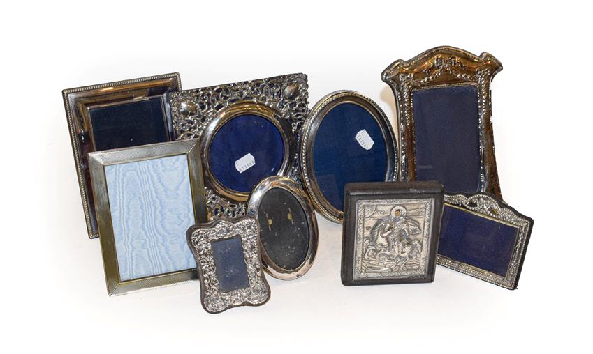 Lot 336 - A collection of six silver photograph frames; two silver plate frames and an icon