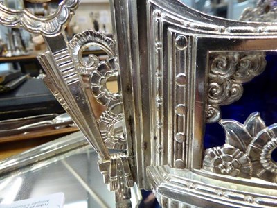 Lot 337 - A silver plate jardiniere and mirror-plateau, each with Art Deco style foliage and flower...