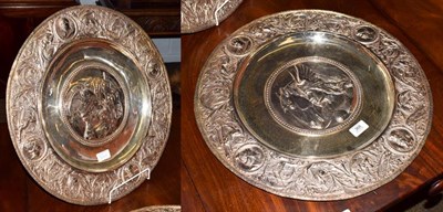 Lot 368 - A pair of silver plate sideboard dishes, each circular, chased with a classical figure in the...