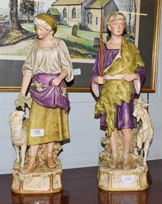 Lot 370 - Pair of Royal Dux figures of a shepherd and companion, decorated in typical hues, pink triangle...