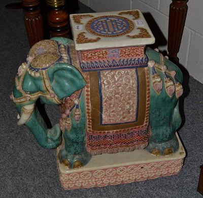 Lot 373 - A pair of 20th century Chinese earthenware elephant form garden seats, 54cm by 55cm high