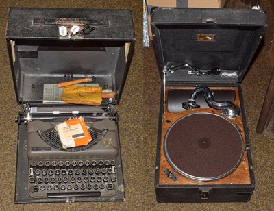 Lot 390 - A cased HMV picnic gramophone and an Imperial typewriter (2)