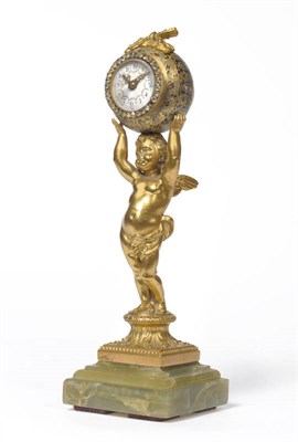 Lot 1401 - A Gilt Metal and Champleve Enamel Figural Desk Timepiece, circa 1910, case with a winged cherub...