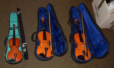 Lot 405 - Three cased Chinese violins