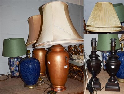 Lot 414 - A large pair of gold brushed urn form table lamps, 90cm overall, together with another pair of...