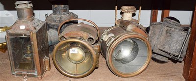 Lot 426 - Six large lamps/lanterns, railway, ship and motoring including a BRC headlamp and another...