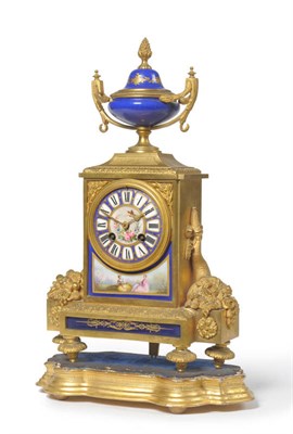 Lot 1417 - An Ormolu and Porcelain Mounted Striking Mantel Clock, circa 1890, surmounted with an urn...