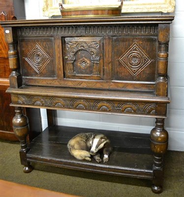 Lot 1114 - An 18th century carved oak court cupboard, 127cm by 61cm by 134cm