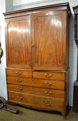 Lot 1132 - A George III cross banded mahogany press cupboard (converted), with strong inlay and raised on...