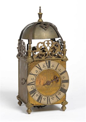 Lot 1422 - A Brass Striking Lantern Clock, the case with pierced, turned brass finials, 6-1/4-inch chapter...