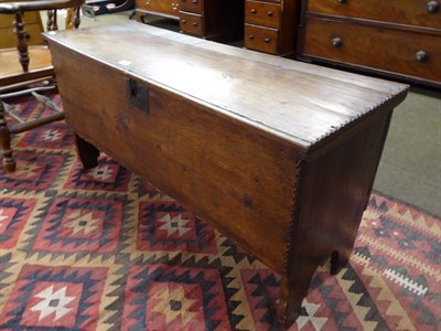 Lot 1168 - A 17th century oak six plank coffer, chip carved and with iron lock plate, 114cm by 39cm by 56cm