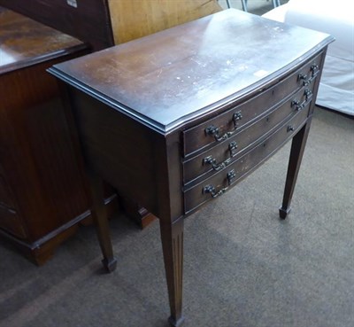 Lot 1169 - An oak three drawer canteen table containing a full plated service