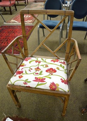 Lot 1177 - A 19th century painted mahogany cockpen armchair with modern crewelwork seat