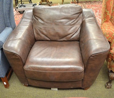 Lot 1187 - A modern brown leather armchair, 108cm by 86cm by 70cm