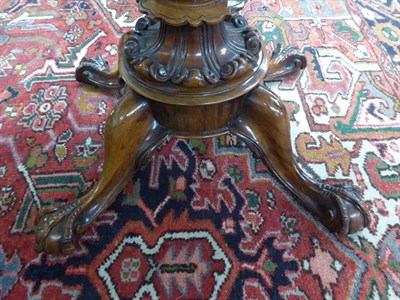 Lot 1200 - A Victorian rosewood fold over card table, 91cm by 44cm by 73cm