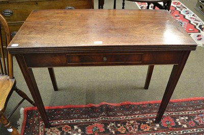 Lot 1201 - A George III mahogany tea table with single drawer and reeded square supports, 91cm by 45cm by 73cm