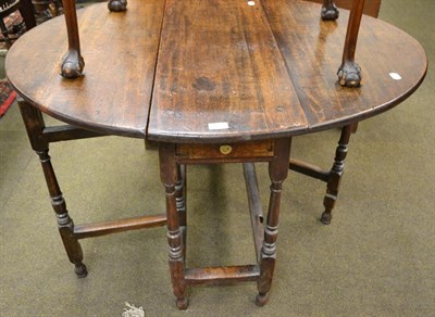 Lot 1203 - An 18th century oak gate leg dining table of small proportions 111cm 89cm by 69cm