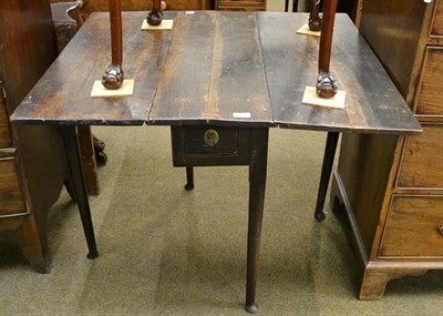 Lot 1205 - An 18th century oak gateleg dining table with single drawer, raised on plain turned supports...
